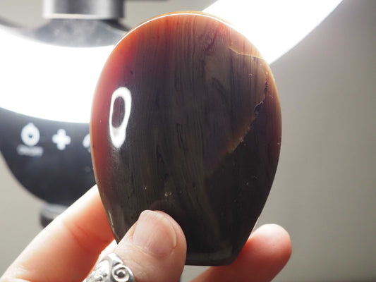 Deep, dark red Amber Freeform A from Indonesia