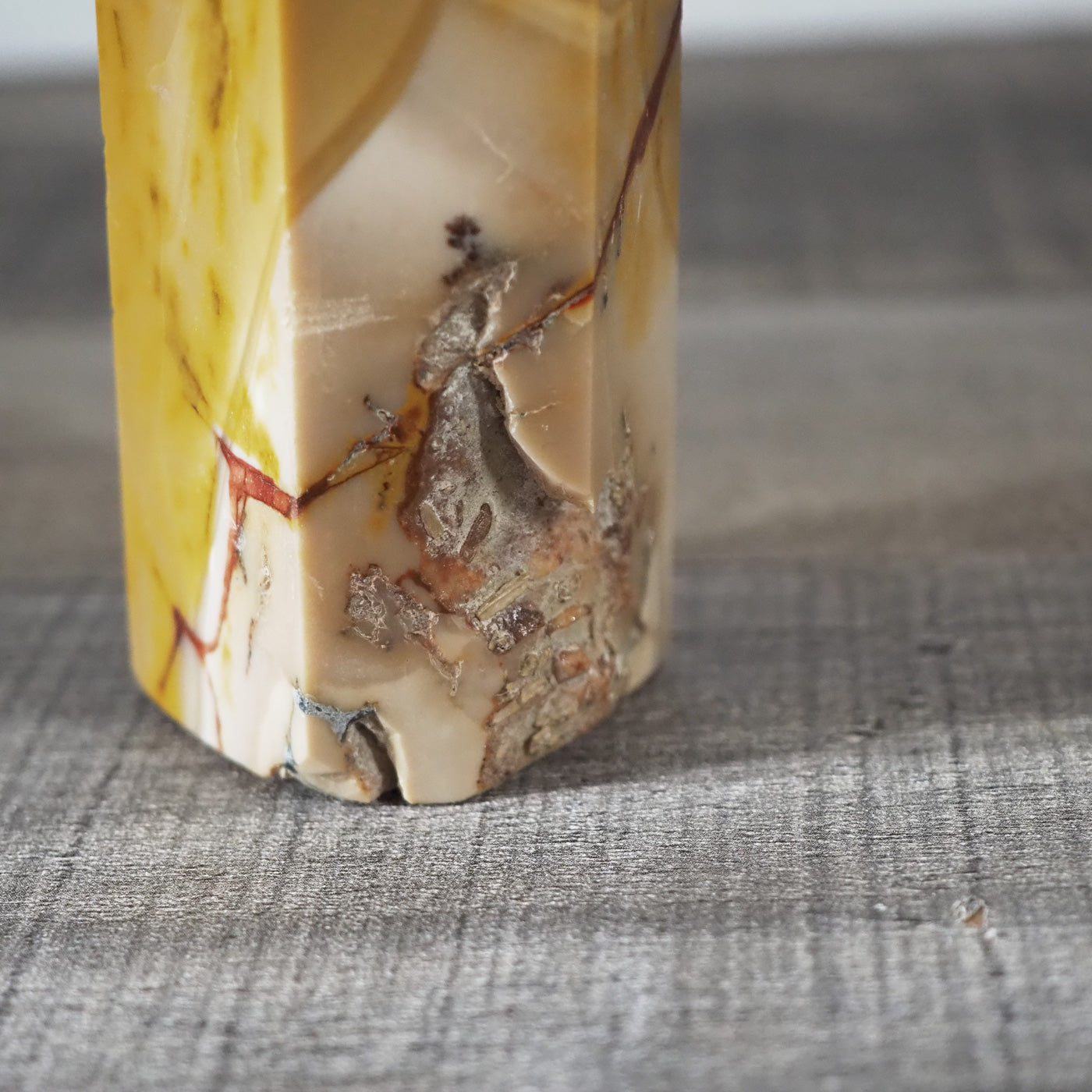 Golden Mookaite tower standing 6.8" tall - Closeup of bottom