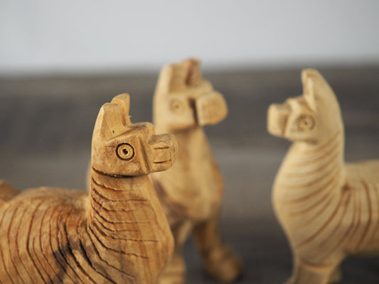 3 little 3" tall hand-carved Palo Santo alpacas