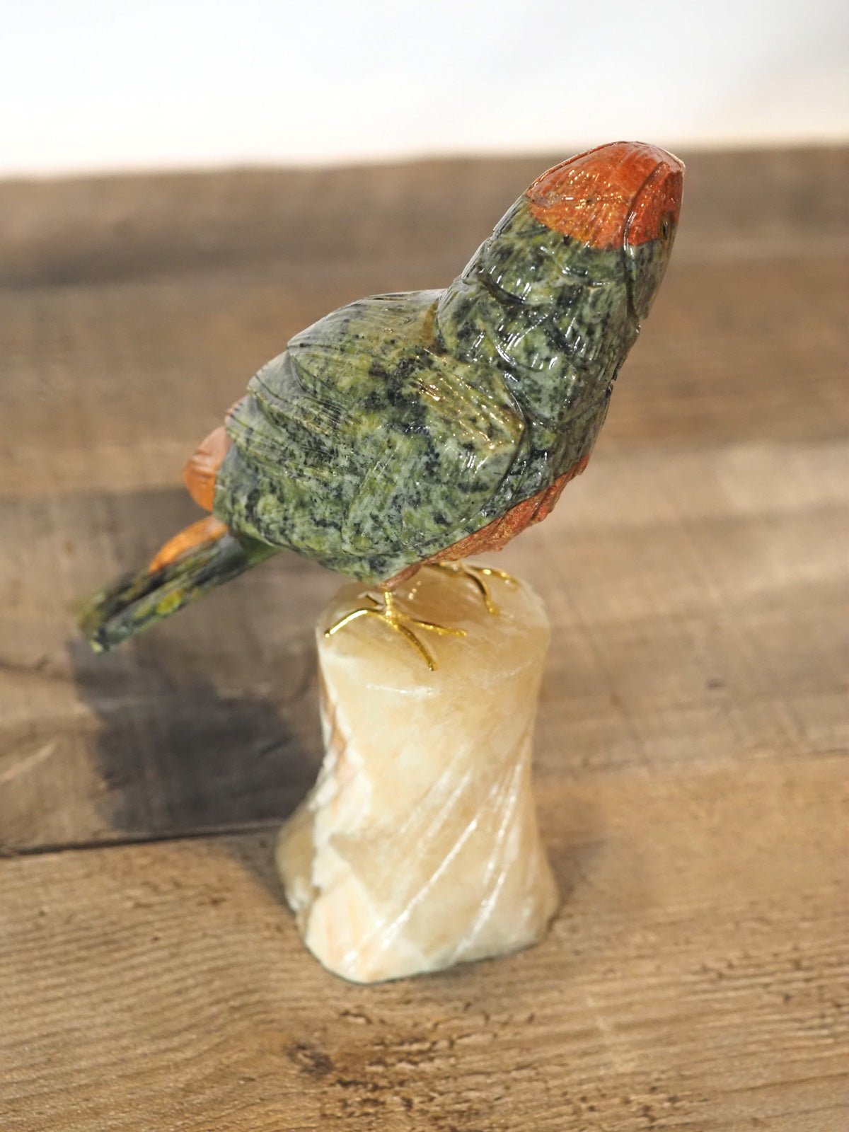 hand-carved parrot with hand-painted accents - Shown from the back