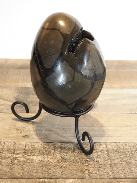 6" tall x 4.5" wide Septarian Dragon Egg sitting on included wrought iron stand