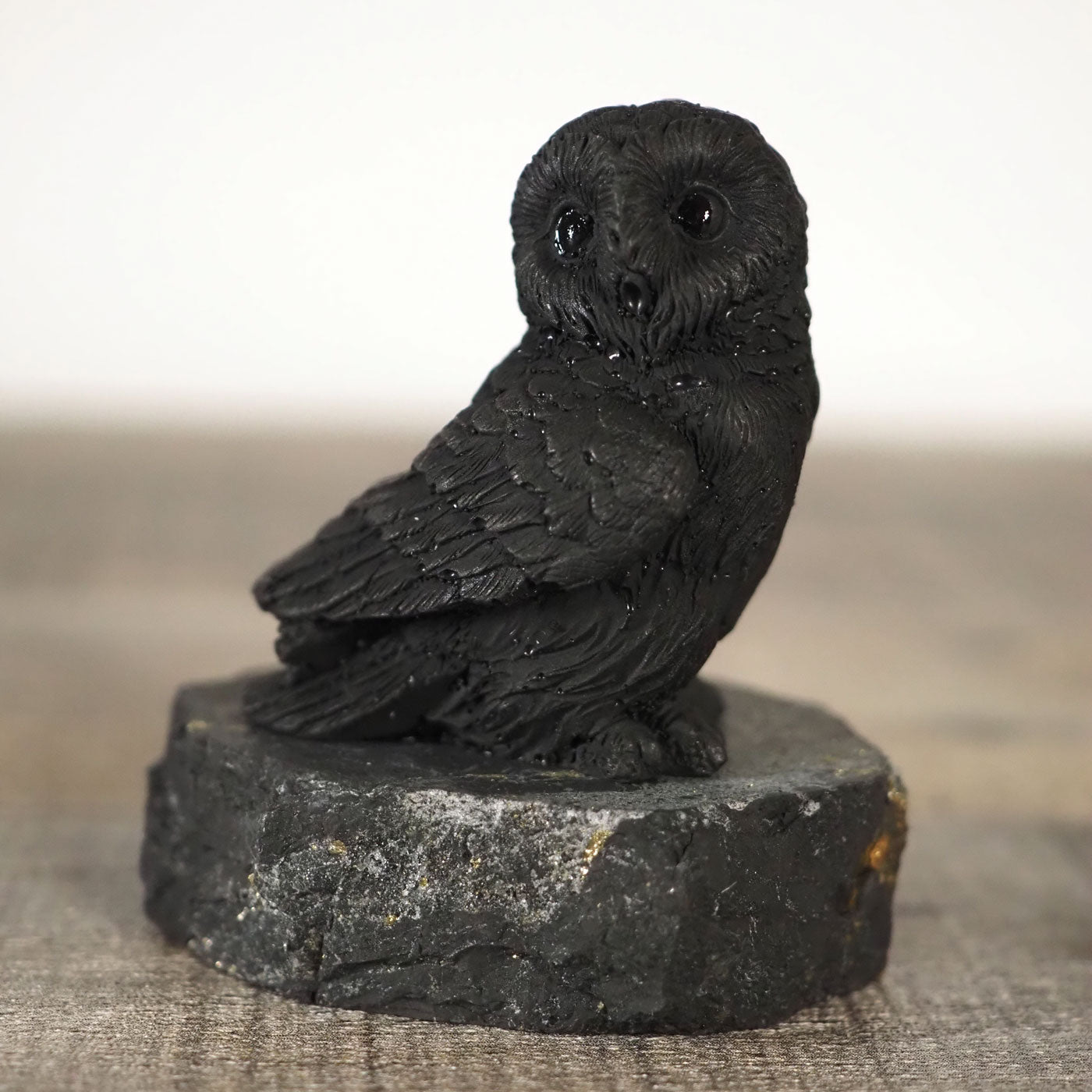 Hand-carved Shungite Owl Carving that is about 2.5" tall