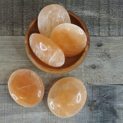 Peach Satin Spar Selenite Palm Stones from Morocco