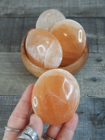 Peach Satin Spar Selenite Palm Stones from Morocco