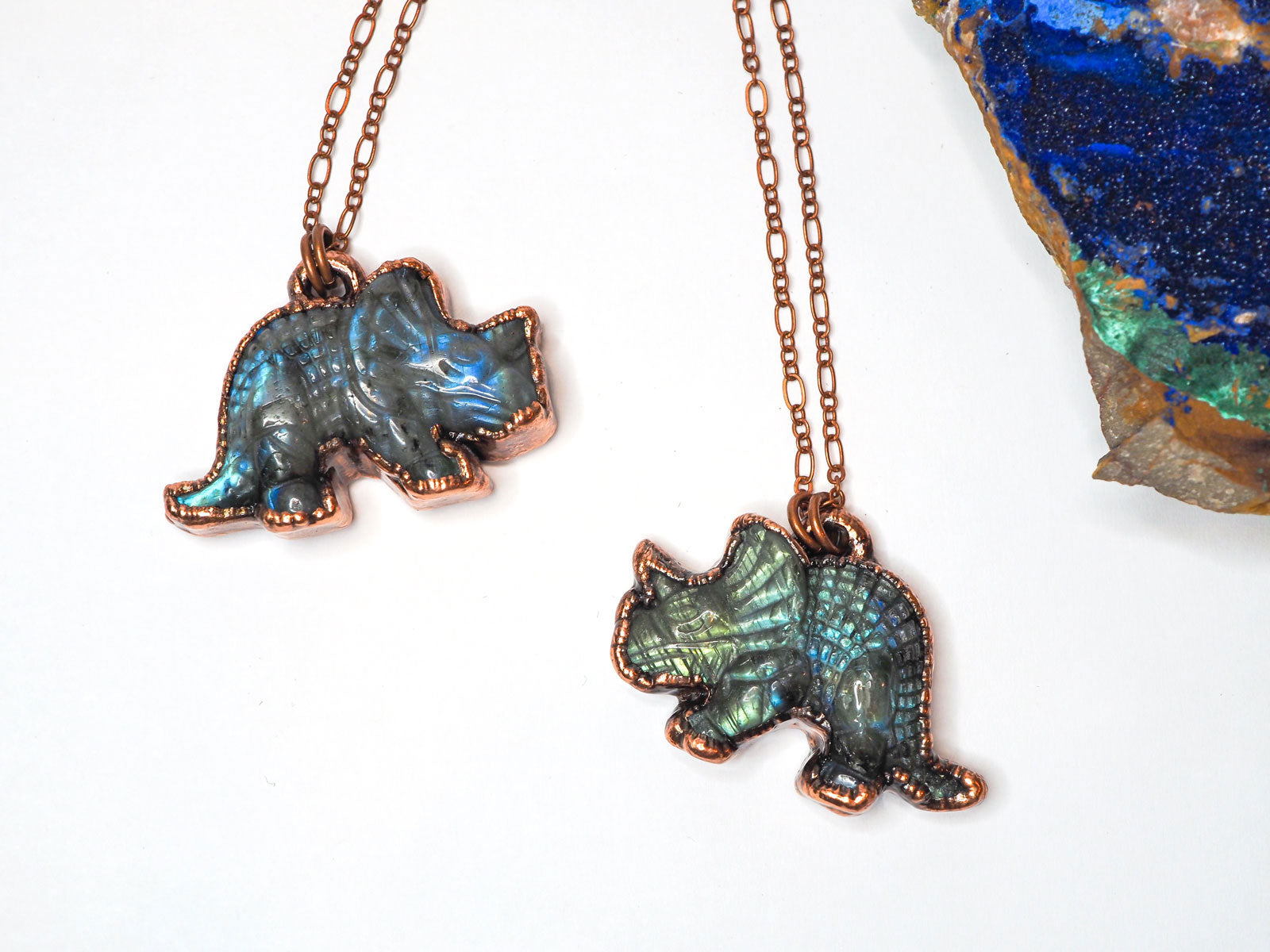 2 carved labradorite triceratops eletroformed copper pendants copper chains
