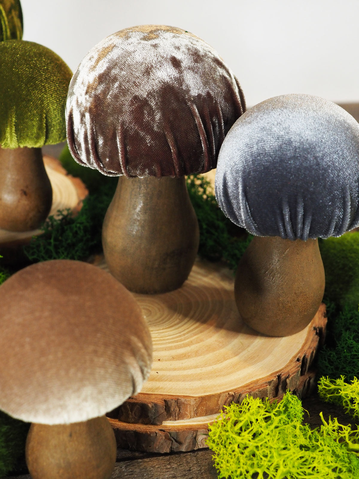 Set of 3 gray hand-made decorative mushrooms with different shades of velvet tops and wooden bases