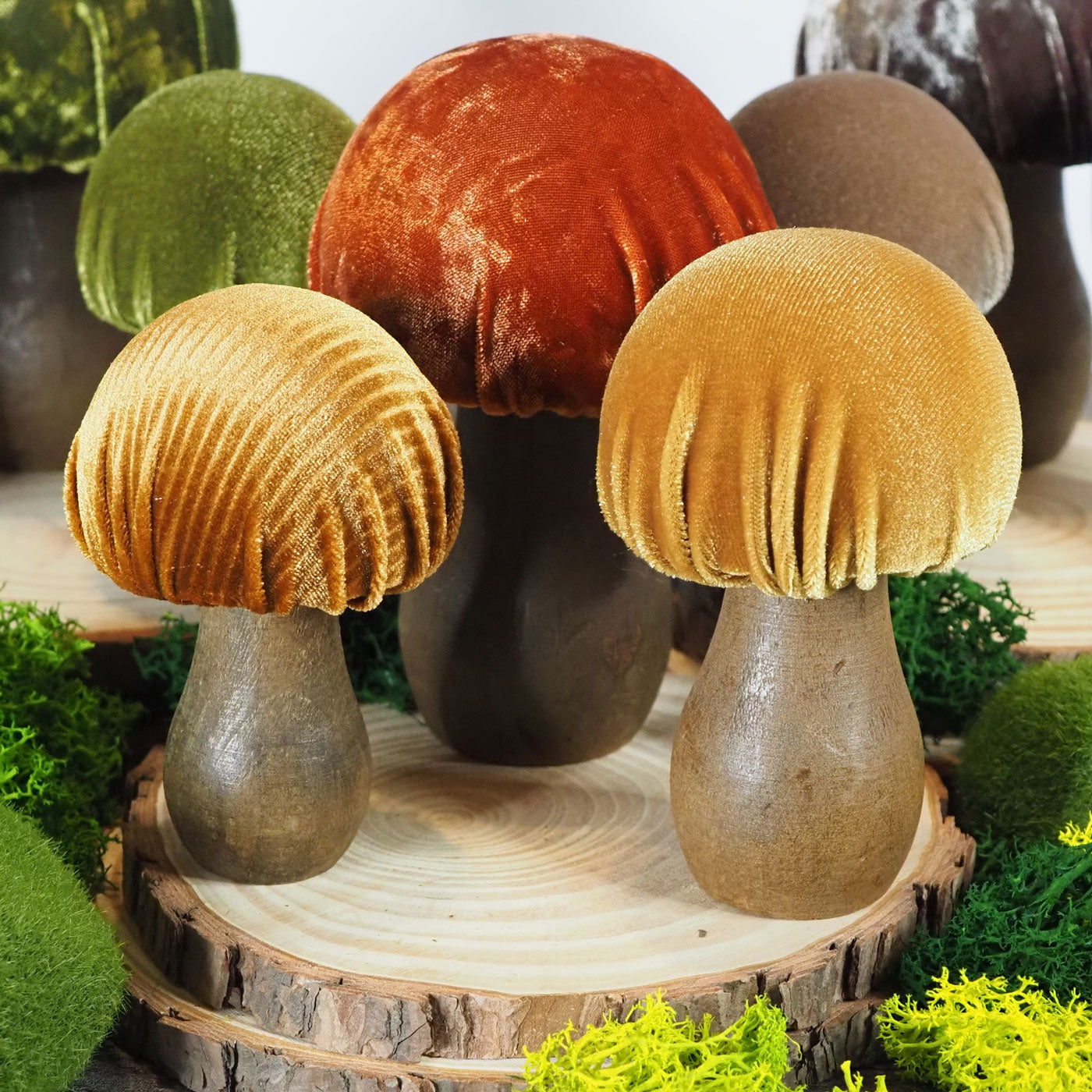Set of 3 rust-colored orange hand-made decorative mushrooms with different shades of velvet tops and wooden bases