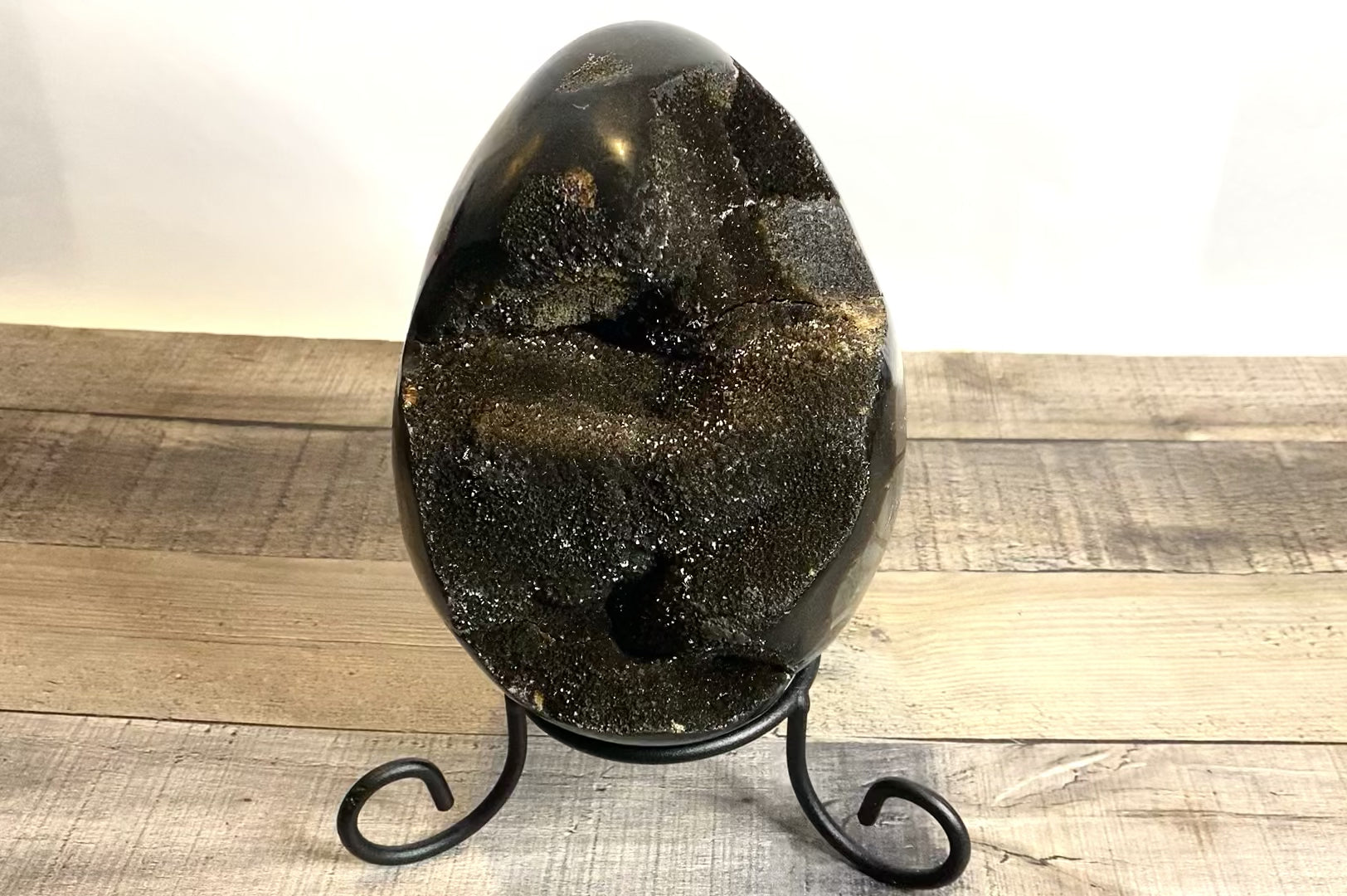 XL 7.25" tall Septarian Dragon Egg with Black Druzy, shown on its included wrought iron stand - Video