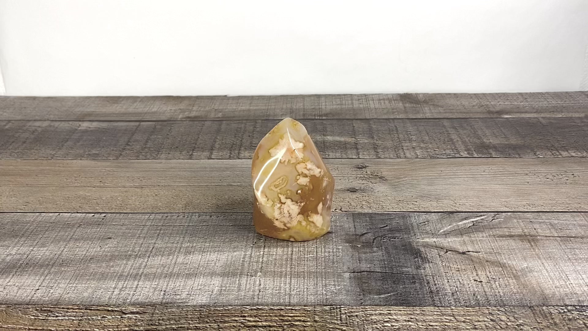 This sculpted flower agate flame is a little over 3