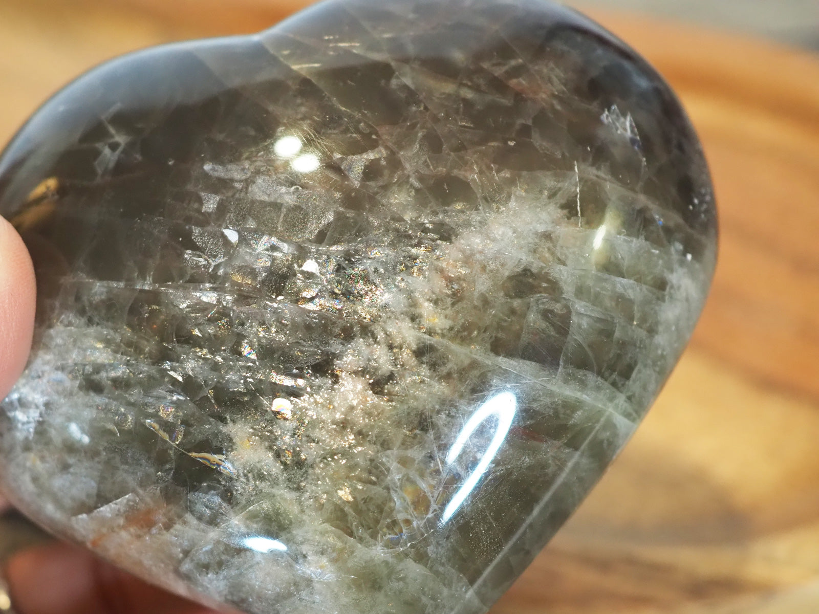 Black Moonstone heart carving - closeup showing sparkle