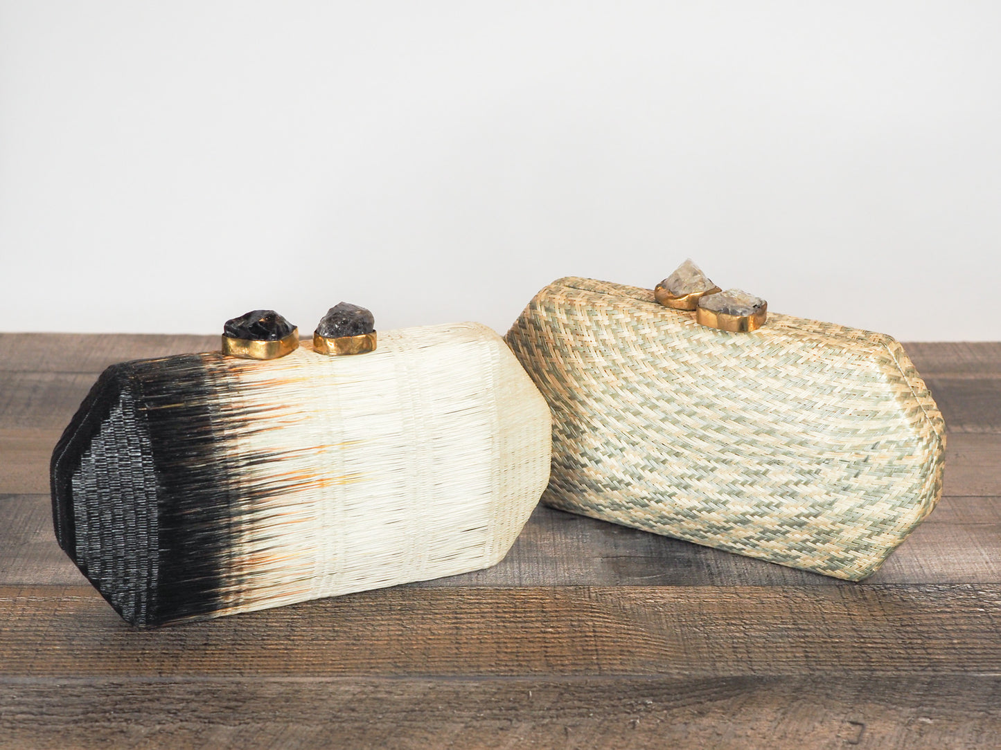Handloomed clutch made from natural plant fibers carefully extracted from the stalks of the tropical buri palm in the Philippines and finished with a beautiful quartz stone closure. - Shown with another buri clutch
