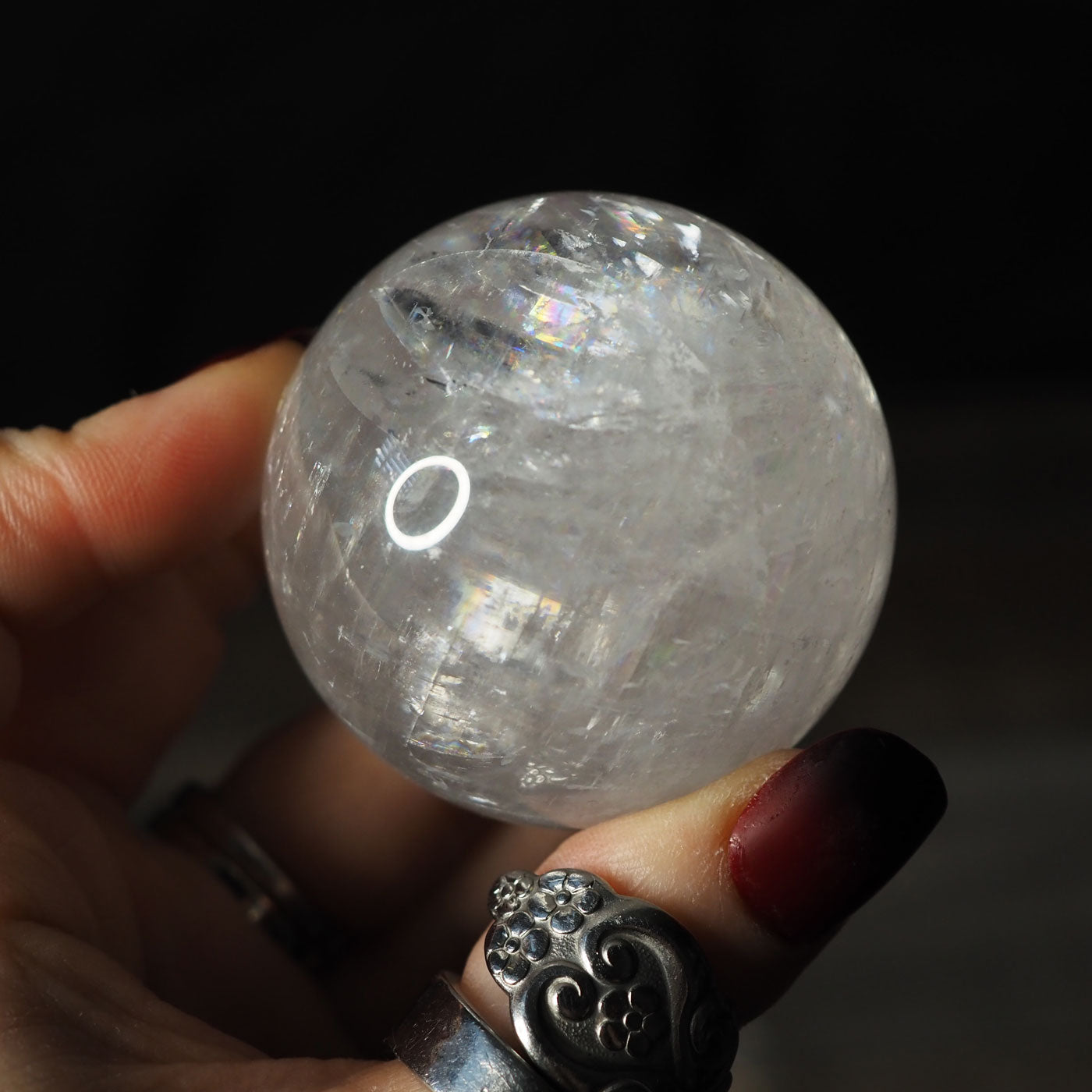 Optical Calcite Sphere with Rainbows