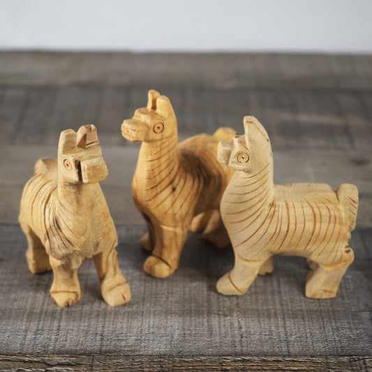 3 little 3" tall hand-carved Palo Santo alpacas