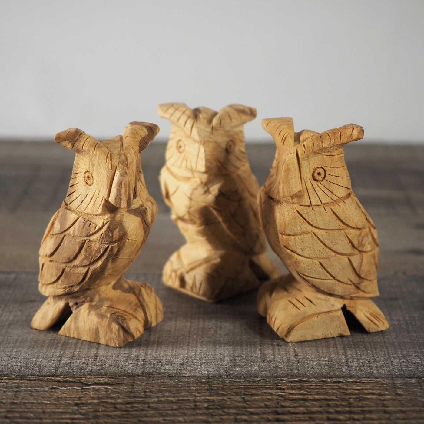 3 little 3" tall hand-carved Palo Santo owls