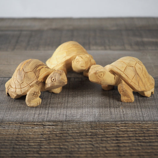 3 little 3" tall hand-carved Palo Santo turtles