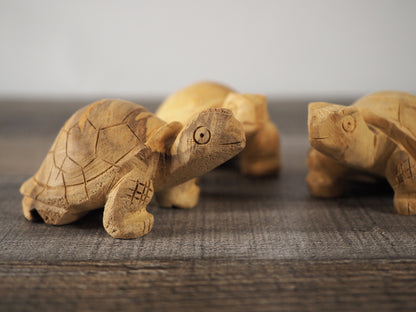 3 little 3" tall hand-carved Palo Santo turtles