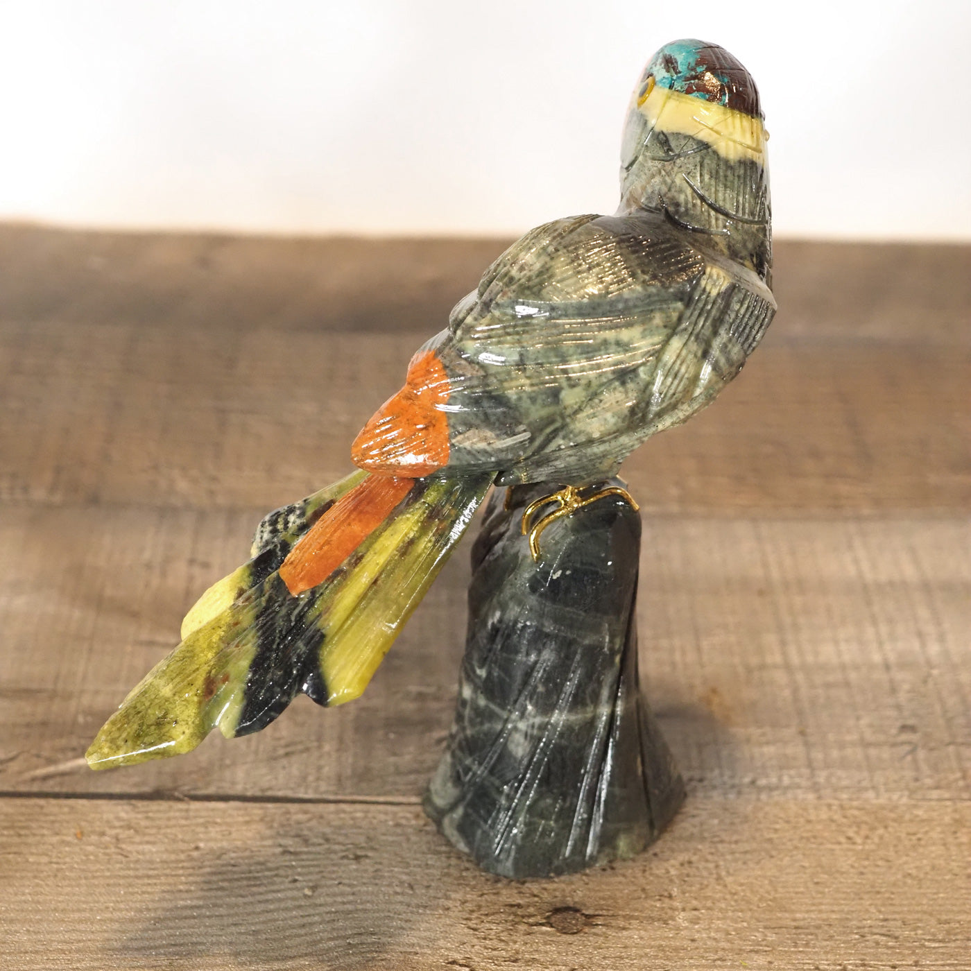 hand-carved parrot with hand-painted accents - Shown from the back