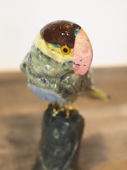 hand-carved parrot with hand-painted accents