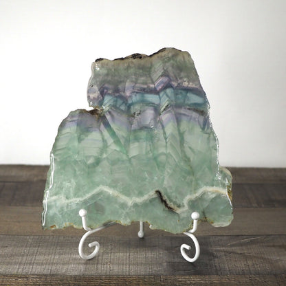7" x 7" pastel Rainbow Fluorite slab sitting on included white metal stand