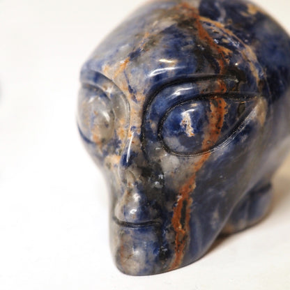 Hand-carved Sodalite Alien Head measuring about 2.25" - Closeup